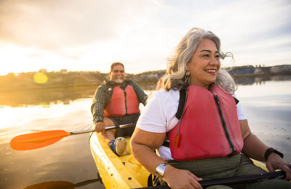 Fitzpatrick Homes Waterstone Big Time Living - couple in a kayak